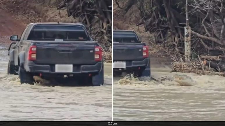 Video: Pickup Truck Drives Over Giant Crocodile At River Crossing In Australia